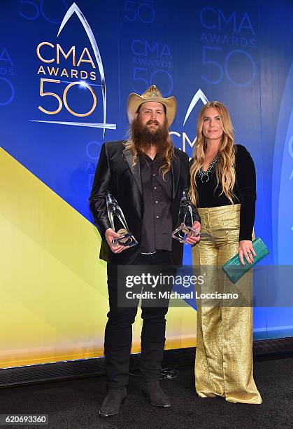 Chris Stapleton and Morgane Stapleton pose with the award for Male Vocalist of the Year and Video of the Year at the 50th annual CMA Awards at the...