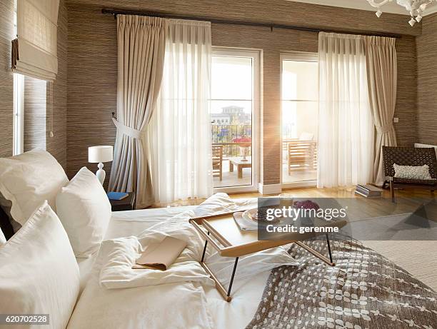 breakfast in bed - newspaper luxury bildbanksfoton och bilder