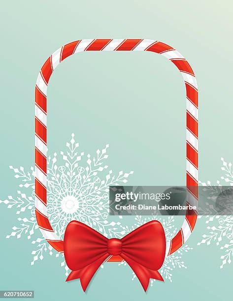 christmas candy cane border with bow and snowflakes - candy cane border stock illustrations