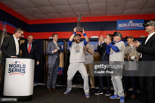 Ben Zobrist of the Chicago Cubs celebrates with the 2016 World Series Most Valuable Player Award after the Chicago Cubs defeated the Cleveland...