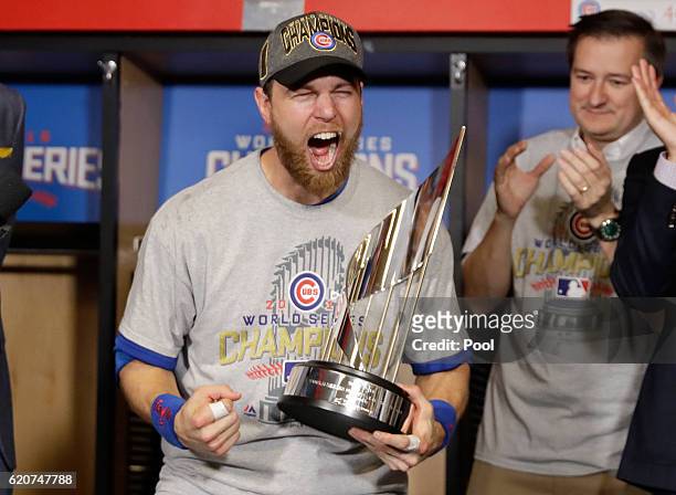 Ben Zobrist of the Chicago Cubs celebrates with the 2016 World Series Most Valuable Player Award after the Chicago Cubs defeated the Cleveland...
