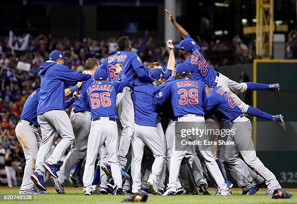 The Chicago Cubs celebrate after winning 8-7 against the Cleveland Indians in Game Seven of the 2016 World Series at Progressive Field on November 2,...