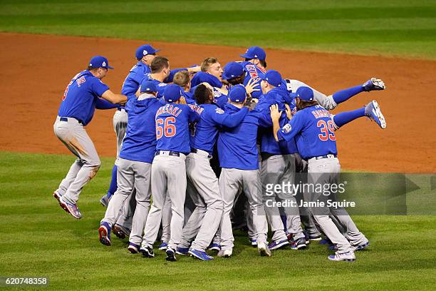 The Chicago Cubs celebrate after defeating the Cleveland Indians 8-7 in Game Seven of the 2016 World Series at Progressive Field on November 2, 2016...