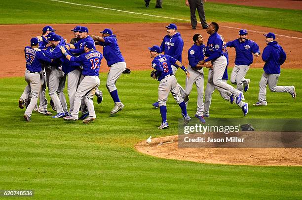 The Chicago Cubs celebrate after defeating the Cleveland Indians 8-7 in Game Seven of the 2016 World Series at Progressive Field on November 2, 2016...