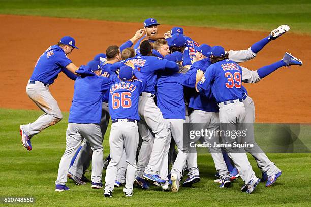 The Chicago Cubs celebrate after defeating the Cleveland Indians 8-7 in Game Seven of the 2016 World Series at Progressive Field on November 2, 2016...