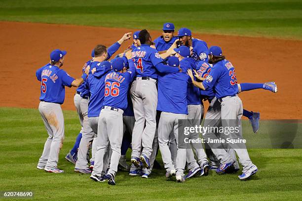 The Chicago Cubs celebrate after defeating the Cleveland Indians 8-7 in Game Seven of the 2016 World Series at Progressive Field on November 2, 2016...