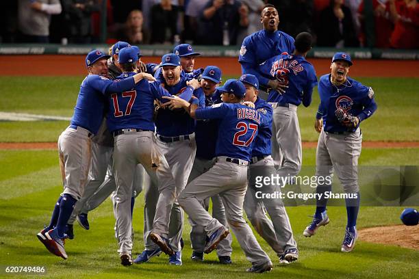The Chicago Cubs celebrate after defeating the Cleveland Indians 8-7 in Game Seven of the 2016 World Series at Progressive Field on November 2, 2016...