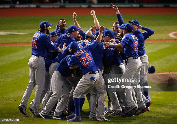 The Chicago Cubs celebrate after defeating the Cleveland Indians 8-7 in Game Seven of the 2016 World Series at Progressive Field on November 2, 2016...