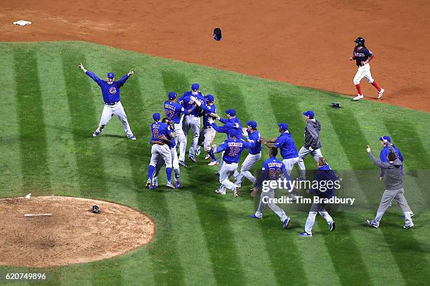 The Chicago Cubs celebrate after defeating the Cleveland Indians 8-7 in Game Seven of the 2016 World Series at Progressive Field on November 2, 2016...