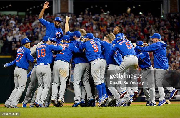 Members of the Chicago Cubs celebrate defeating the Cleveland Indians in Game 7 of the 2016 World Series at Progressive Field on Wednesday, November...