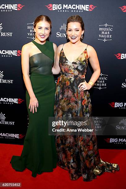 Maddie Marlow and Tae Dye of Maddie & Tae attend the Big Machine Label Group's celebration of the 50th Annual CMA Awards at Marathon Music Works on...