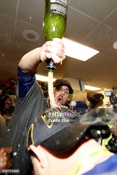 John Lackey of the Chicago Cubs celebrates with teammates in the clubhouse after the Cubs defeated the Cleveland Indians 8-7 in Game Seven of the...