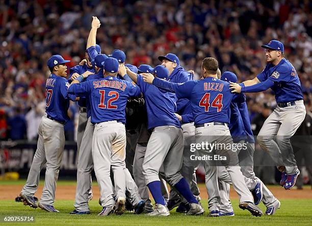 The Chicago Cubs celebrate after defeating the Cleveland Indians 8-7 in Game Seven of the 2016 World Series at Progressive Field on November 2, 2016...