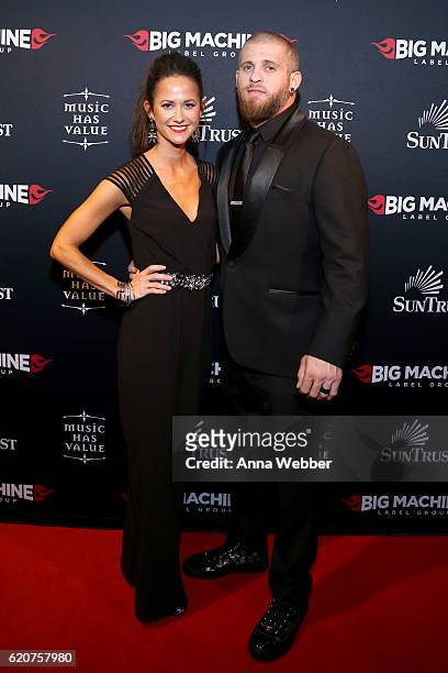 Singer-songwriter Brantley Gilbert and Amber Cochran attend the Big Machine Label Group's celebration of the 50th Annual CMA Awards at Marathon Music...