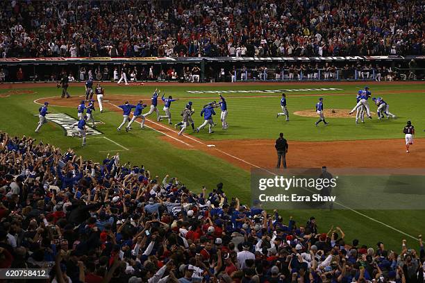 The Chicago Cubs celebrate after defeating the Cleveland Indians 8-7 in Game Seven of the 2016 World Series at Progressive Field on November 2, 2016...