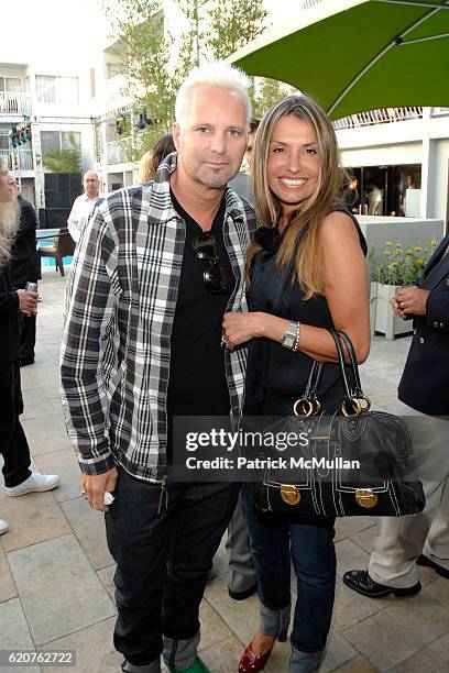 Marvin Scott Jarrett and Jaclynn Jarrett attend Gibson Through The Lens Photo Exhibit at Sunset Marquis Hotel on July 30, 2008 in West Hollywood, CA.