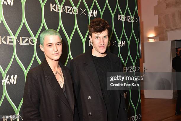 DJs Agathe Mougin and guest attend the KENZO x H&M Paris Launch Party at Hotel De Brossier on November on November 2, 2016 in Paris, France.