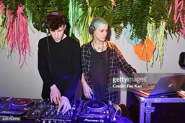 DJs Agathe Mougin and guest perform during the KENZO x H&M Paris Launch Party at Hotel De Brossier on November on November 2, 2016 in Paris, France.