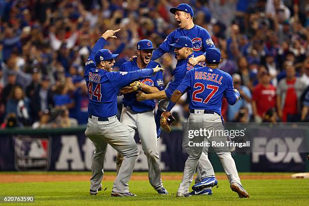 Members of the Chicago Cubs celebrate defeating the Cleveland Indians in Game 7 of the 2016 World Series at Progressive Field on Wednesday, November...