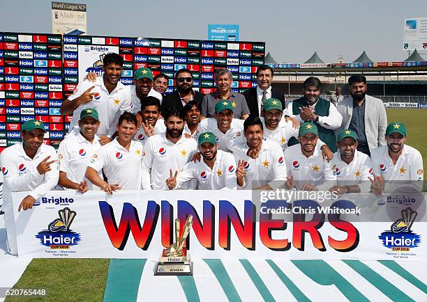 The Pakistan team celebrate winning the series on day five of the third test between Pakistan and West Indies at Sharjah Cricket Stadium on November...