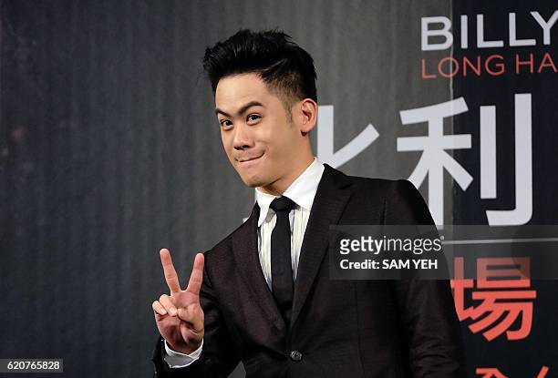 Actor Mason Lee poses during a press conference to promote the film "Billy Lynns Long Halftime Walk" in Taipei on November 3, 2016. Taiwan-born Lee...