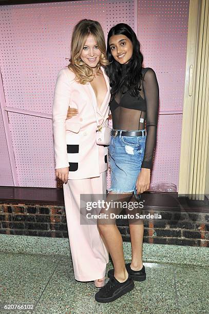 Entrepreneur Poppy Elizabeth Jamie and model Neelam Gill attend Poppy Jamie, Suki Waterhouse, Leo Seigal and Cade Hudson celebration of the launch of...