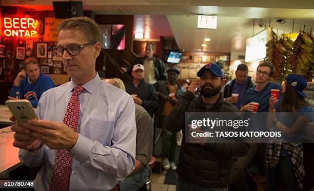 Chicago fans gather at the Billy Goat Tavern to watch the Chicago Cubs take on the Cleveland Indians in Cleveland in game seven of the 2016 World...