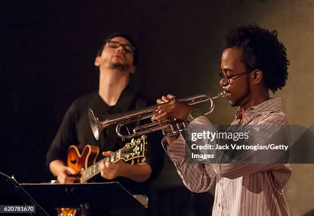 American Jazz musician Jonathan Finlayson plays trumpet with his band, Sicilian Defense,during the Festival of New Trumpet Music evening at Vision...