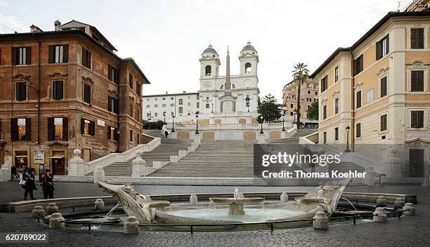 Rome, Italy The Spanish Steps without tourists in the morning. Scalinata di Trinita dei Monti and Fontana della Barcaccia on October 13, 2016 in...
