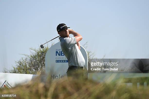 Garrick Porteous of England tees off on the 14th hole during day two of the NBO Golf Classic Grand Final at Al Mouj Golf on November 3, 2016 in...