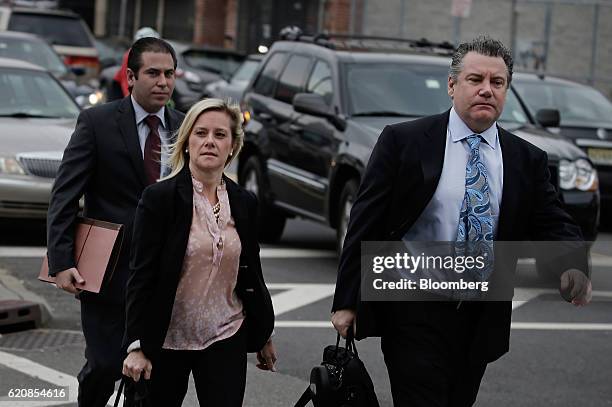 Bridget Anne Kelly, former deputy chief of staff for New Jersey Governor Chris Christie, center, arrives at federal court in Newark, New Jersey,...