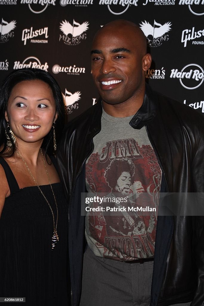 Ginny Barber and Tiki Barber attend ICONS OF MUSIC II AUCTION to