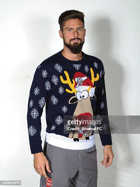 Olivier Giroud of Arsenal in his Arsenal Christmas Jumper to support Save the Childrens Christmas Jumper Day at London Colney on October 21, 2016 in...