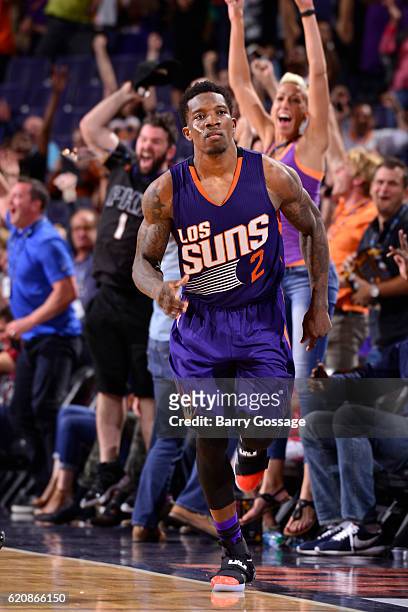 Eric Bledsoe of the Phoenix Suns celebrates as he runs up court after making the game winning three point basket in overtime against the Portland...