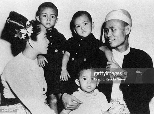 File photo taken in 1947 shows family of Myanmar opposition leader Aung San Suu Kyi when she was two years old -- herself , her father Gen. Aung San...
