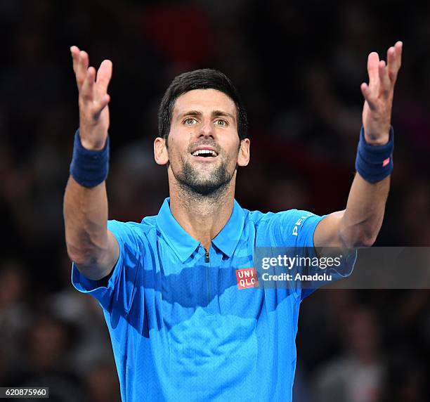 Novak Djokovic of Serbia celebrates after winning the Men's second round match against Grigor Dimitrov of Bulgria on day four of the BNP Paribas...