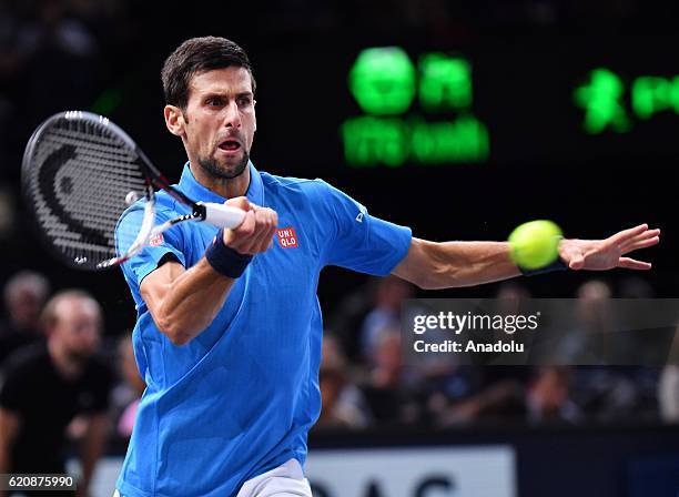 Novak Djokovic of Serbia plays a forehand during the Men's second round match against Grigor Dimitrov of Bulgria on day four of the BNP Paribas...