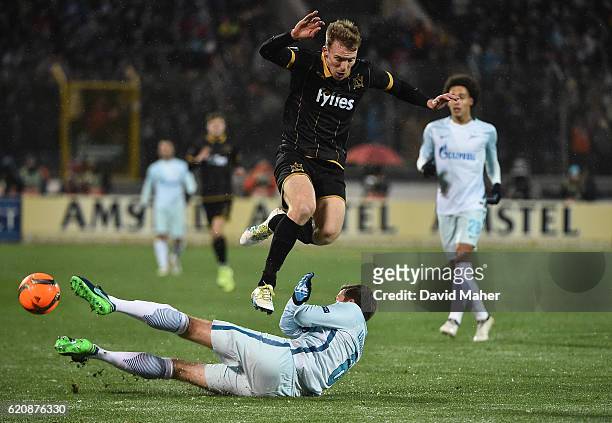 St Petersburg , Russia - 3 November 2016; David McMillan of Dundalk in action against Nicolas Lombaerts of Zenit St Petersburg during the UEFA Europa...