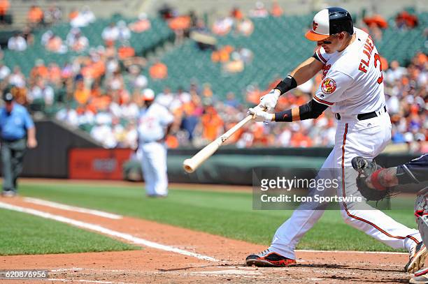 Baltimore Orioles third baseman Ryan Flaherty singles against the Cleveland Indians at Orioles Park at Camden Yards in Baltimore, MD. Where the...