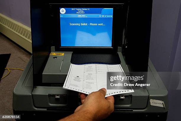 Voting Scanner System 157 Ballot Scanner Stock Photos, High-Res Pictures, and Images - Getty ...