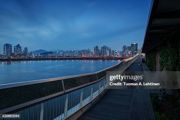 view of a residential district and bridge in seoul - han river stock pictures, royalty-free photos & images
