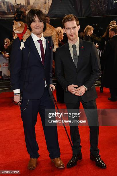 James Bowen with Bob the cat and Luke Treadway attend the UK Premiere of "A Street Cat Named Bob" in aid of Action On Addiction on November 3, 2016...