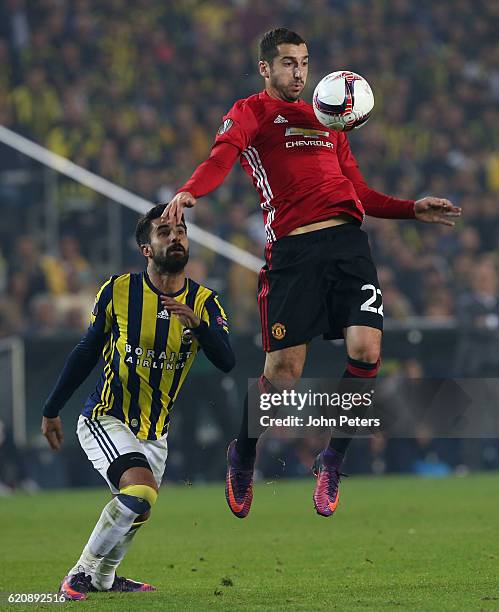 Henrikh Mkhitaryan of Manchester United in action with Alper Potuk of Fenerbahce during the UEFA Europa League match between Manchester United and...