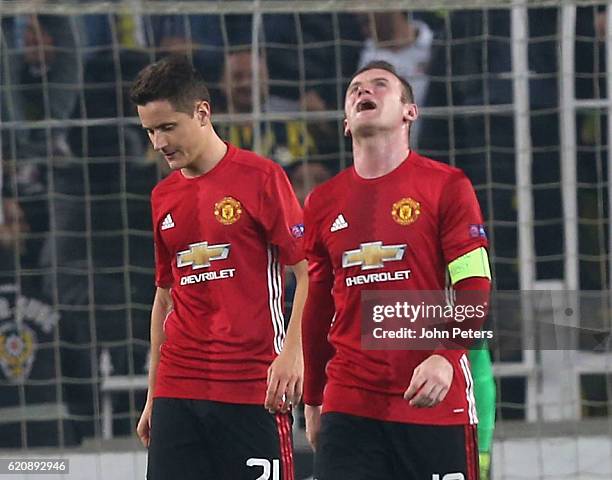 Wayne Rooney and Ander Herrera of Manchester United react to conceding a goal to Jermaine Lens of Fenerbahce during the UEFA Europa League match...