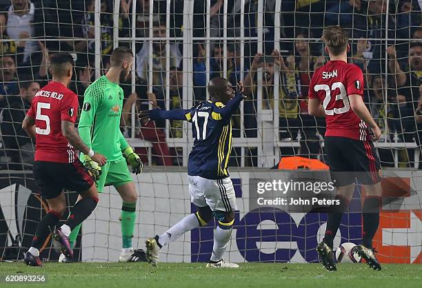 Moussa Sow of Fenerbahce celebrates Jermaine Lens scoring their second goal during the UEFA Europa League match between Manchester United and...