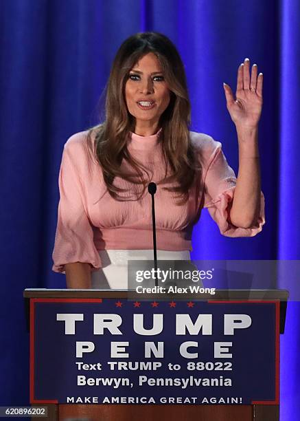 Melania Trump, wife of Republican presidential nominee Donald Trump, waves to supporters during a campaign event November 3, 2016 in Berwyn,...