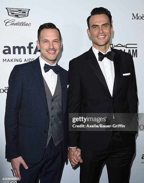 Actors Jason Landau and Cheyenne Jackson arrive at amfAR's Inspiration Gala Los Angeles at Milk Studios on October 27, 2016 in Hollywood, California.