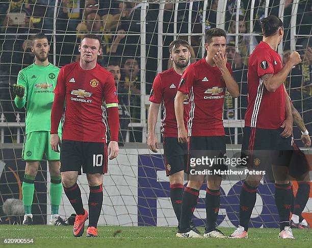 David de Gea, Wayne Rooney, Luke Shaw and Ander Herrera of Manchester United react to conceding a goal to Jermaine Lens of Fenerbahce during the UEFA...