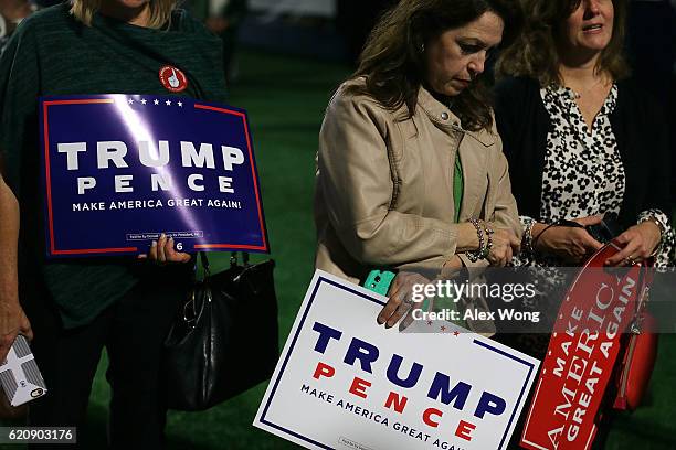 Supporters participate in a prayer during a campaign event November 3, 2016 in Berwyn, Pennsylvania. Melania Trump, wife of Republican presidential...