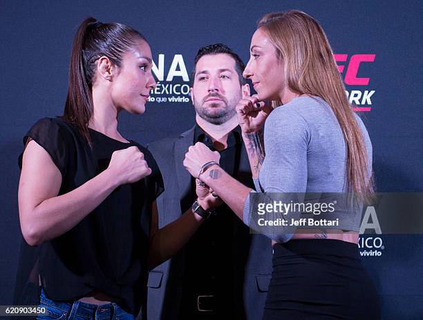 Alexa Grasso of Mexico and Heather Jo Clark of the United States face off during the UFC Fight Night Ultimate Media Day at the Auditorio Blackberry...